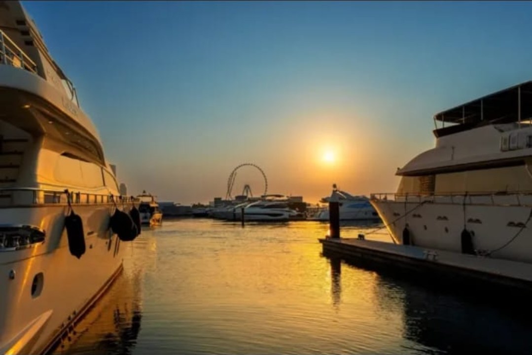 Luxury yacht marina at sunset
